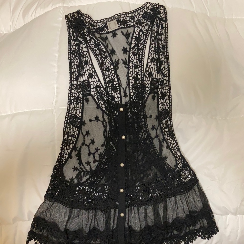 Lace, pearl button sleeveless shirt.